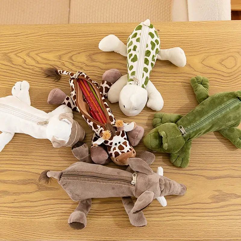 Set of plush animal pencil cases resembling crocodile, lion, giraffe, and zebra, soft fabric, perfect for children&
