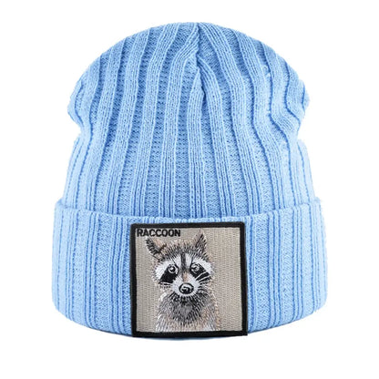 Light blue knitted beanie with raccoon patch, cozy unisex winter hat, ribbed pattern, suitable for winter, SKU: 14:1254