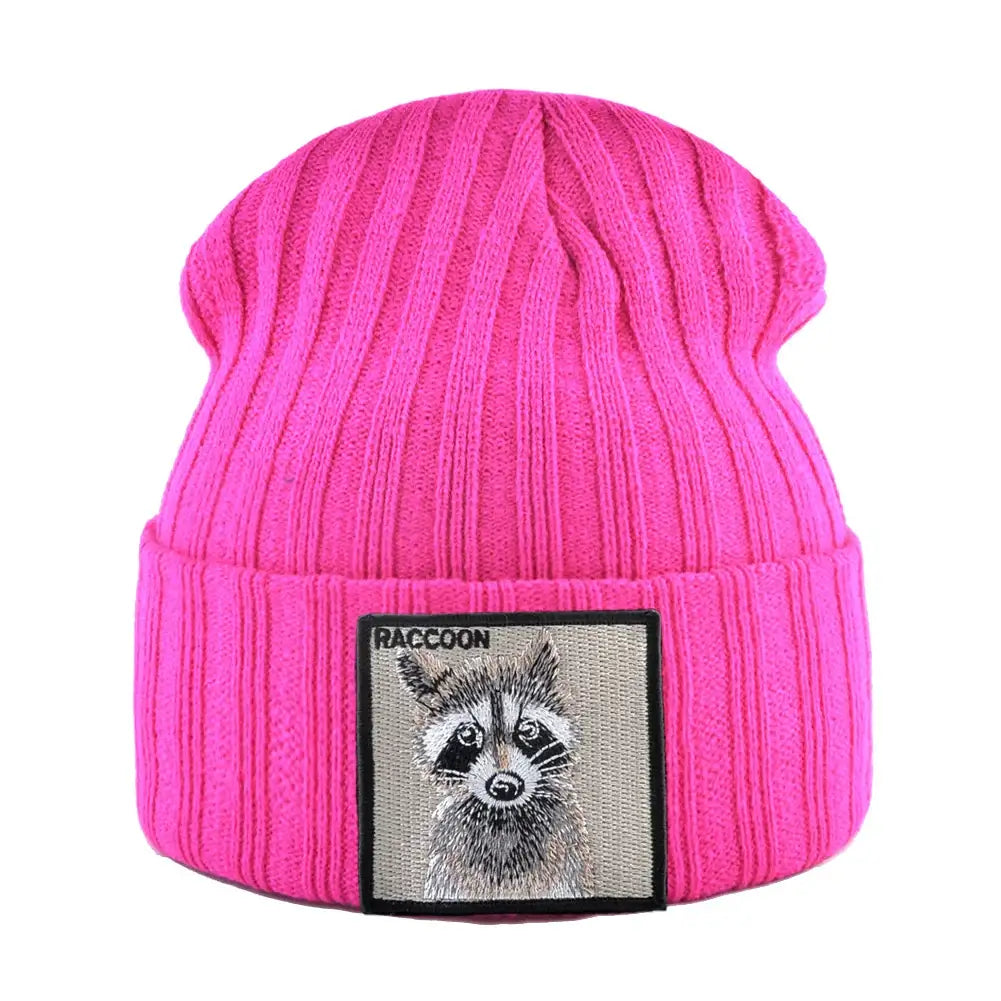 Bright pink knitted beanie with ribbed texture and raccoon patch embroidery, warm unisex winter hat for cold weather