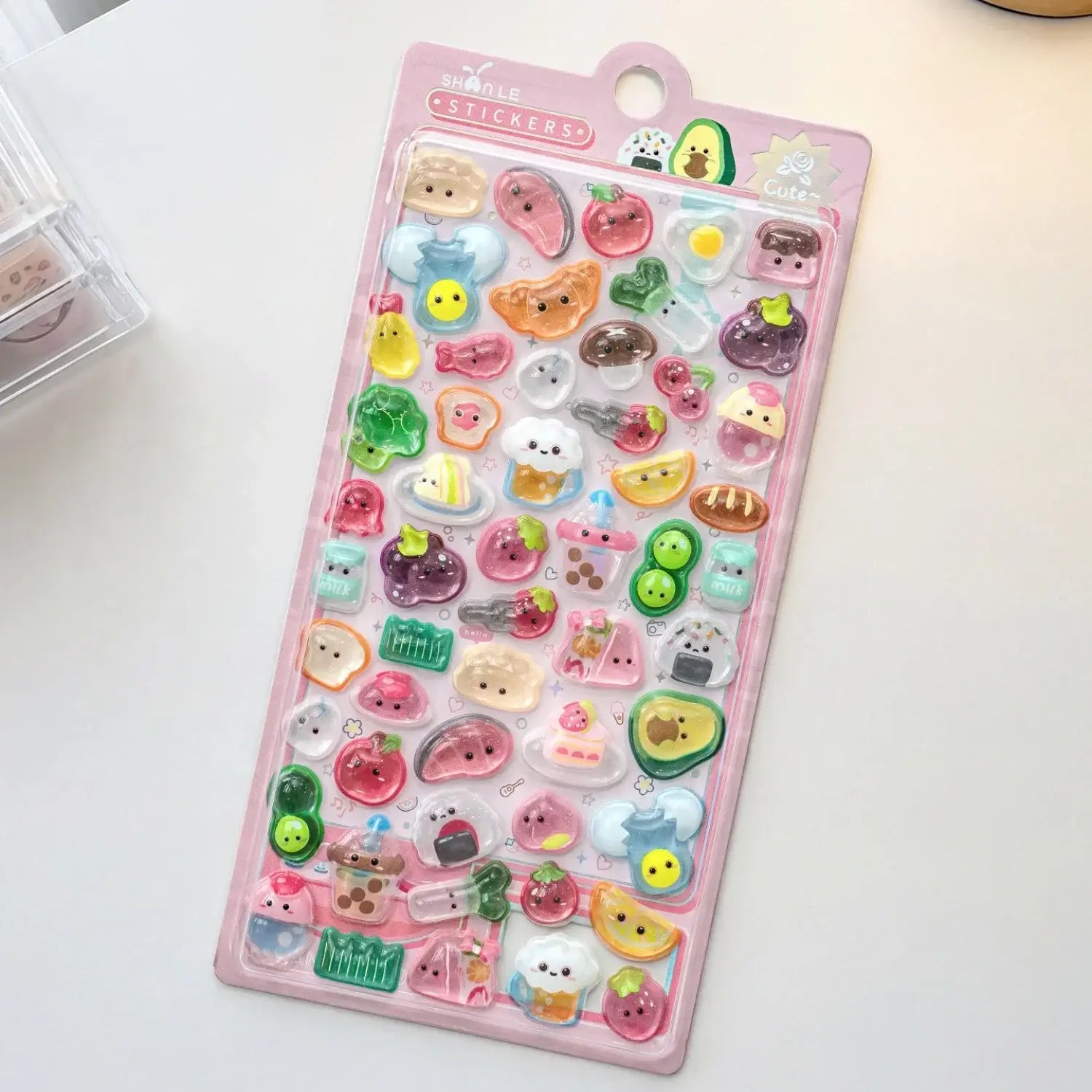 Collection of colorful 3D kawaii stickers with adorable animal, food, and beverage motifs on transparent sheets for creative decoration