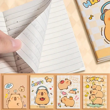 Mini notepad with colorful cartoon capybaras, fish, and bears, featuring a playful design for fun note-taking