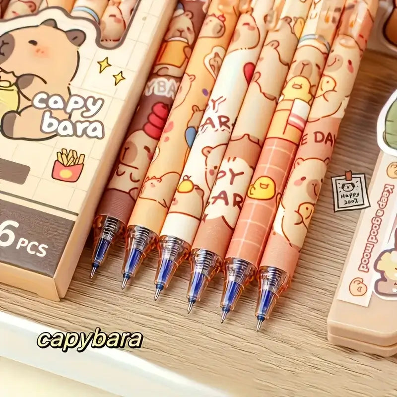 radierbare Capybara Gelstifte 6er Set auf einem Tisch, stilvolle und niedliche Gelstifte für Schule und Büro.