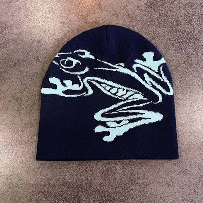 Navy blue knitted beanie with white dragon graphic, unisex winter hat, soft and warm for cold seasons, SKU: 14:1052