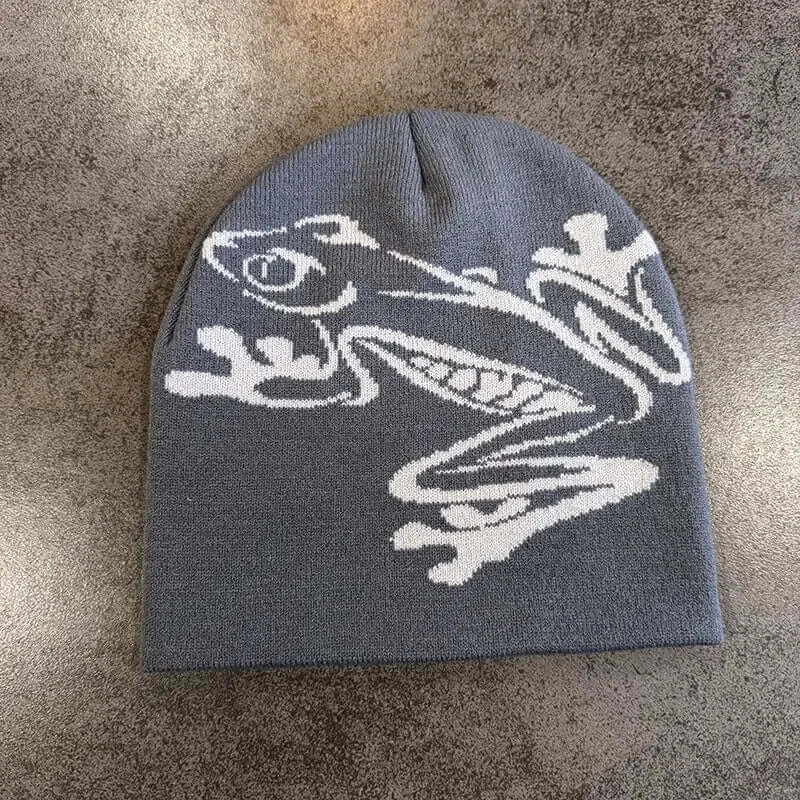Gray unisex beanie featuring white dragon design, cozy knit material, ideal for autumn and winter, fashionable winter hat.