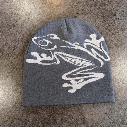 Gray unisex beanie featuring white dragon design, cozy knit material, ideal for autumn and winter, fashionable winter hat.