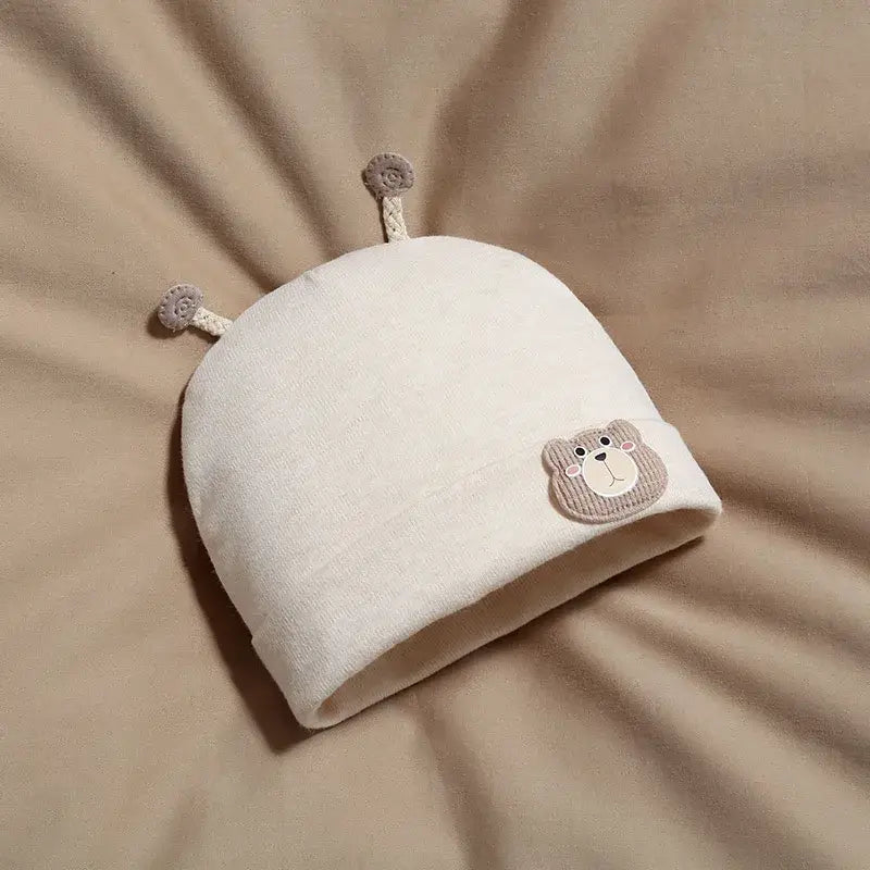 Cream-colored baby hat with bear face embroidery, soft fabric, with bear ears on top, suitable for infants, SKU: 14:29