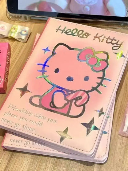 Kitty Dream Notizbuch mit Hello Kitty Design in sanften Rosa-Tönen und holografischen Details.