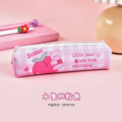 Pink pencil case with cute bear and peach design, featuring the words &