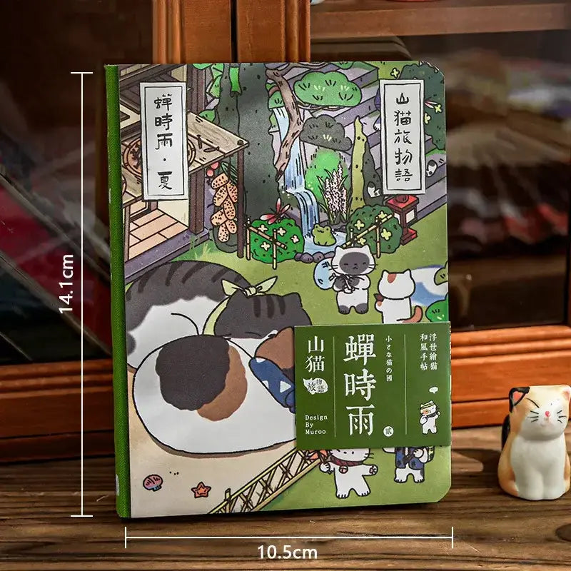 Katzenmotiv Reise-Notizbuch mit buntem Cover, ideal zum Festhalten von Reiseerinnerungen.