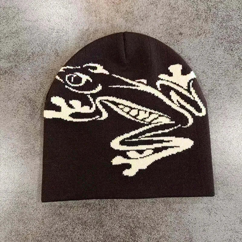 Black unisex beanie with white dragon graphic, soft knit material, suitable for fall and winter, stylish and warm accessory.