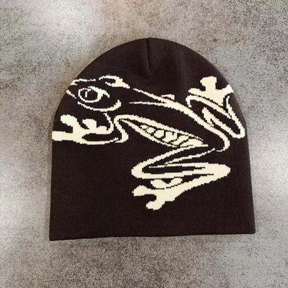 Black unisex beanie with white dragon graphic, soft knit material, suitable for fall and winter, stylish and warm accessory.