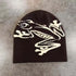 Black unisex beanie with white dragon graphic, soft knit material, suitable for fall and winter, stylish and warm accessory.