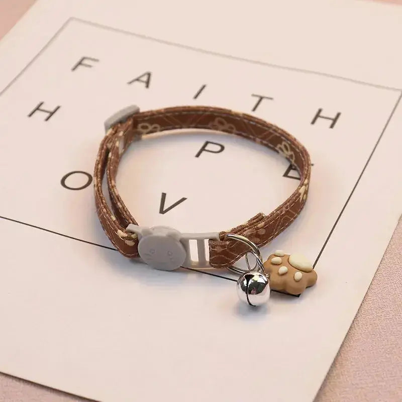 Verstellbares Haustierhalsband mit Glocke und Pfotenmotiv Petoria