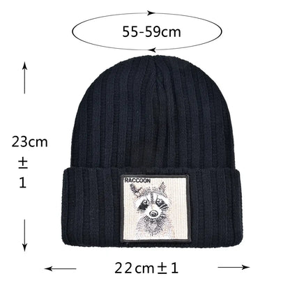 Black knitted beanie with raccoon patch, measuring 23cm height and 22cm width, featuring a patch with raccoon illustration, ideal for winter.