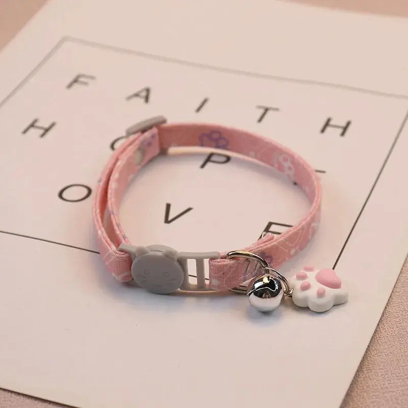 Verstellbares Haustierhalsband mit Glocke und Pfotenmotiv Petoria