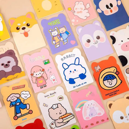 Bunt gestaltete Kawaii Mini-Notizbücher Set mit verschiedenen Cartoon-Motiven und niedlichen Charakteren.