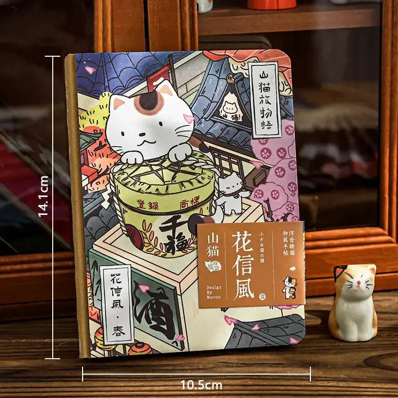 Katzenmotiv Reise-Notizbuch mit charmantem Design und Katzenillustrationen auf dem Cover.