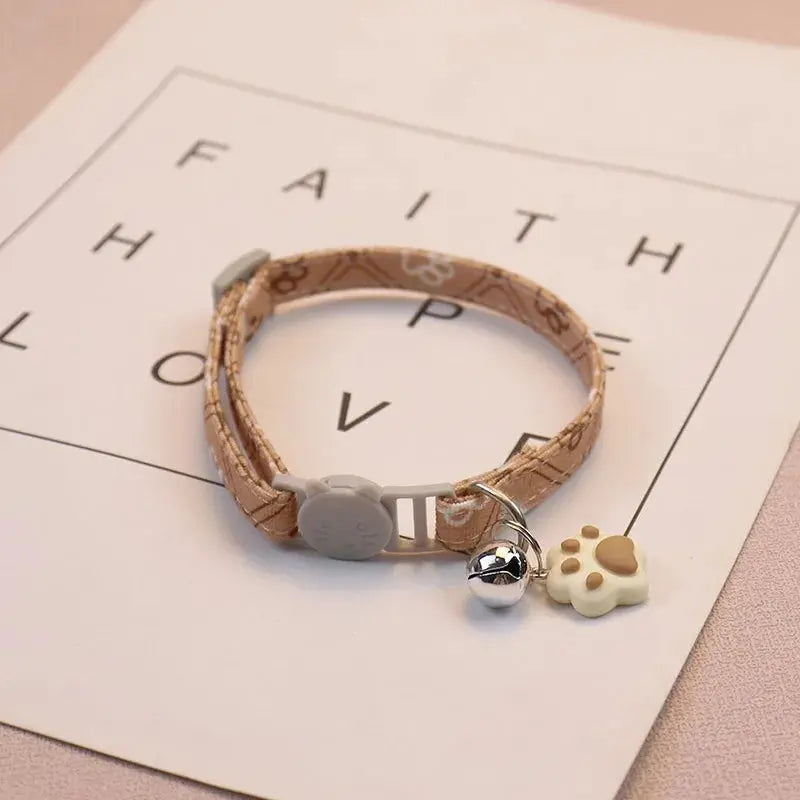 Verstellbares Haustierhalsband mit Glocke und Pfotenmotiv Petoria